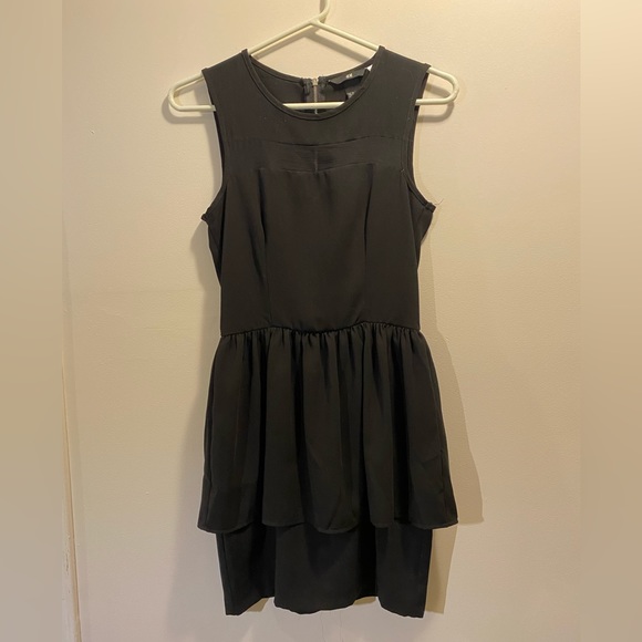 Sleeveless Black Peplum Mini Dress - Picture 1 of 7